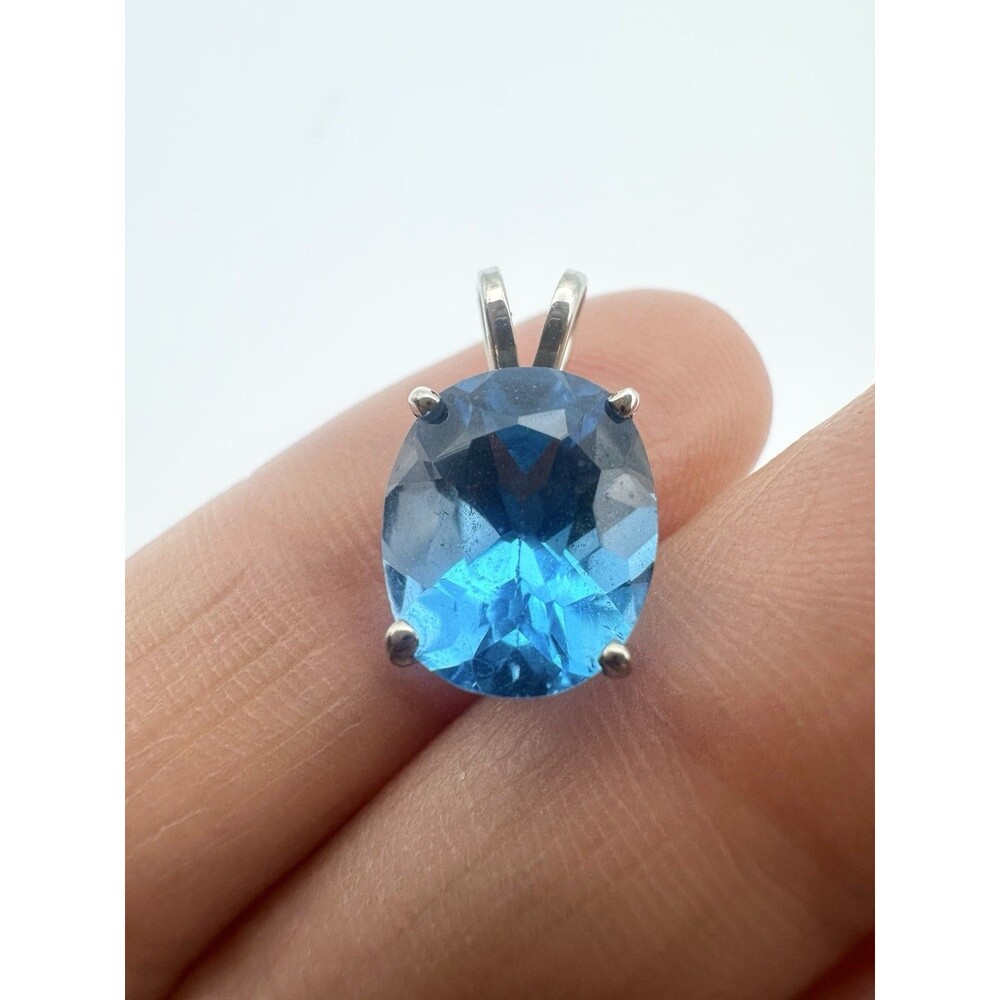 14k White Gold Oval Blue Topaz Pendant
